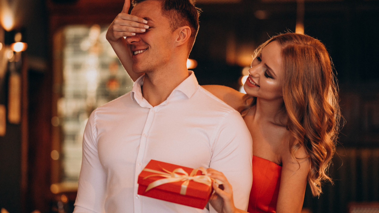 Woman holding a present for her boyfriend on valentines day